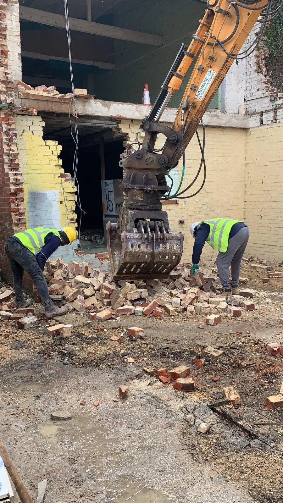 contractors-reclaiming-red-bricks-reading-site.jpg