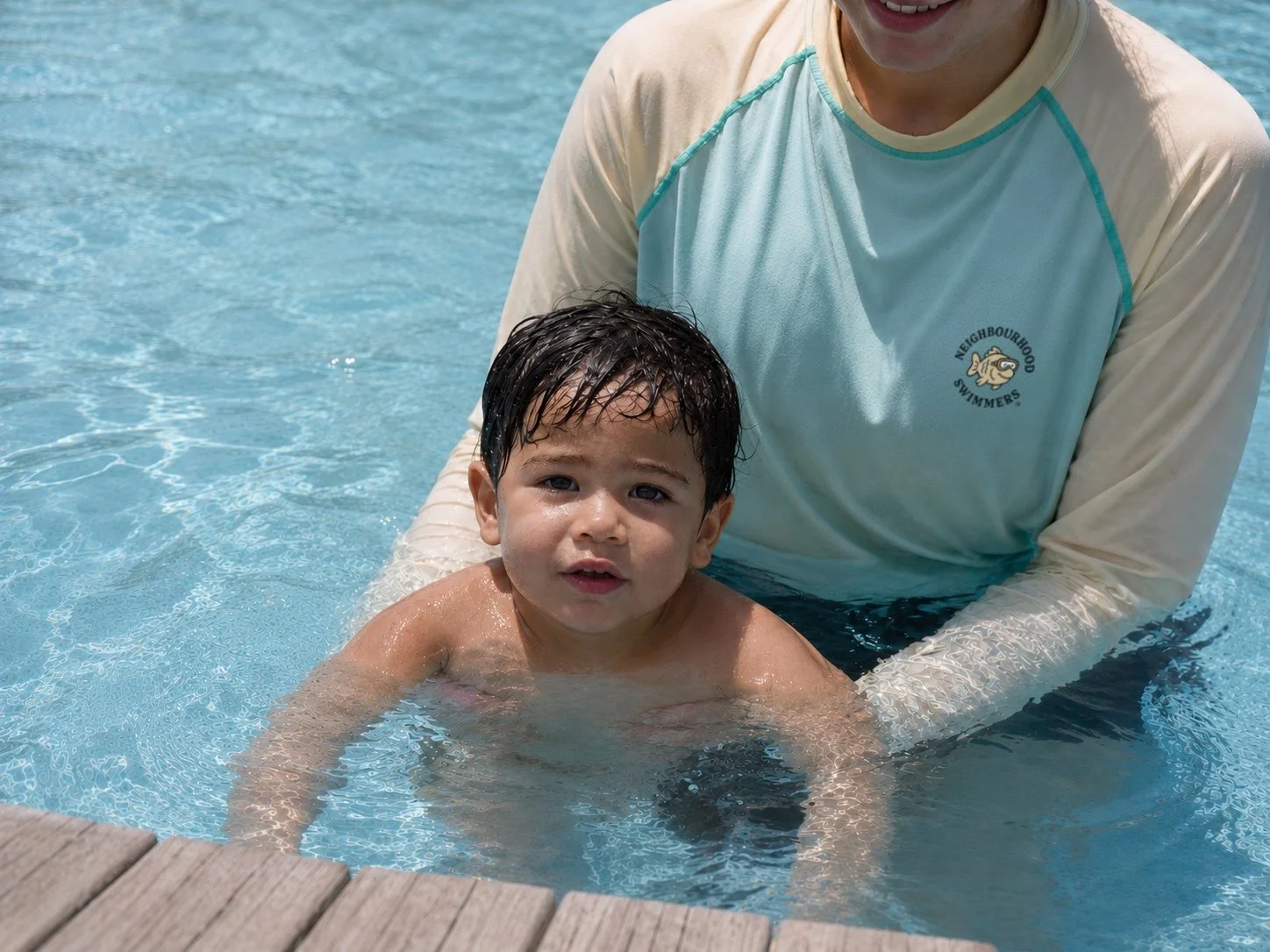 A-young-boy-swimming-in-a-pool