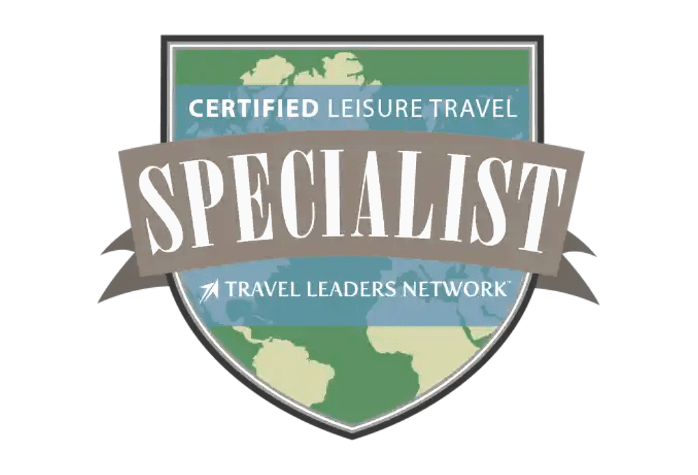 A badge with a world map background showing green continents and blue oceans. The badge has a gray banner with the word 'SPECIALIST' in large white letters, above smaller text that reads 'CERTIFIED LEISURE TRAVEL' and below that 'TRAVEL LEADERS NETWORK' with a small arrow.