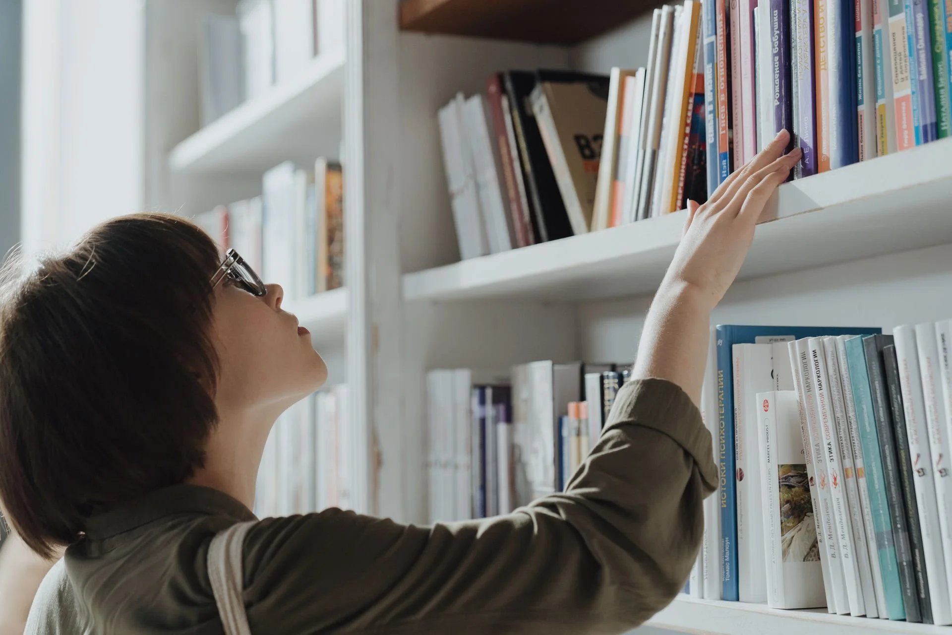 ISTJ in the library choosing a book