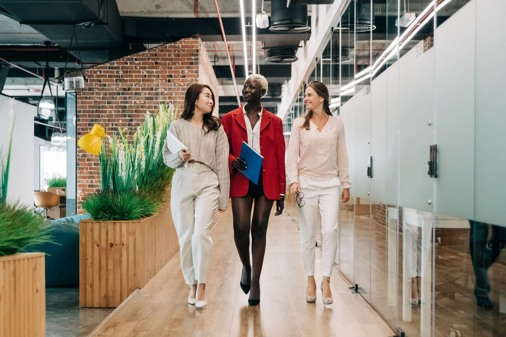Boss ESTJ women walking in a corporate office