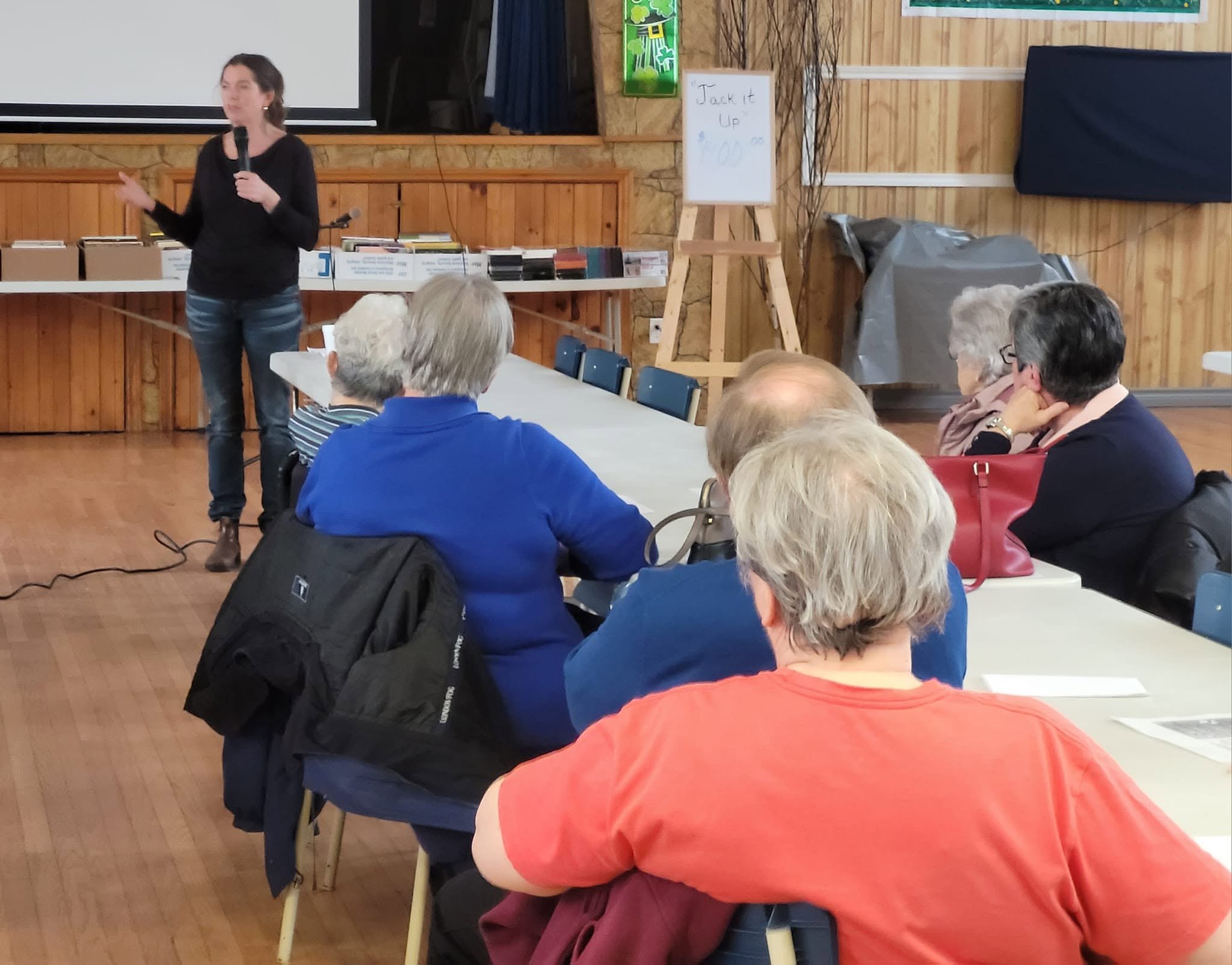 Celeste Gotell leading a discussion with seniors at a community meeting