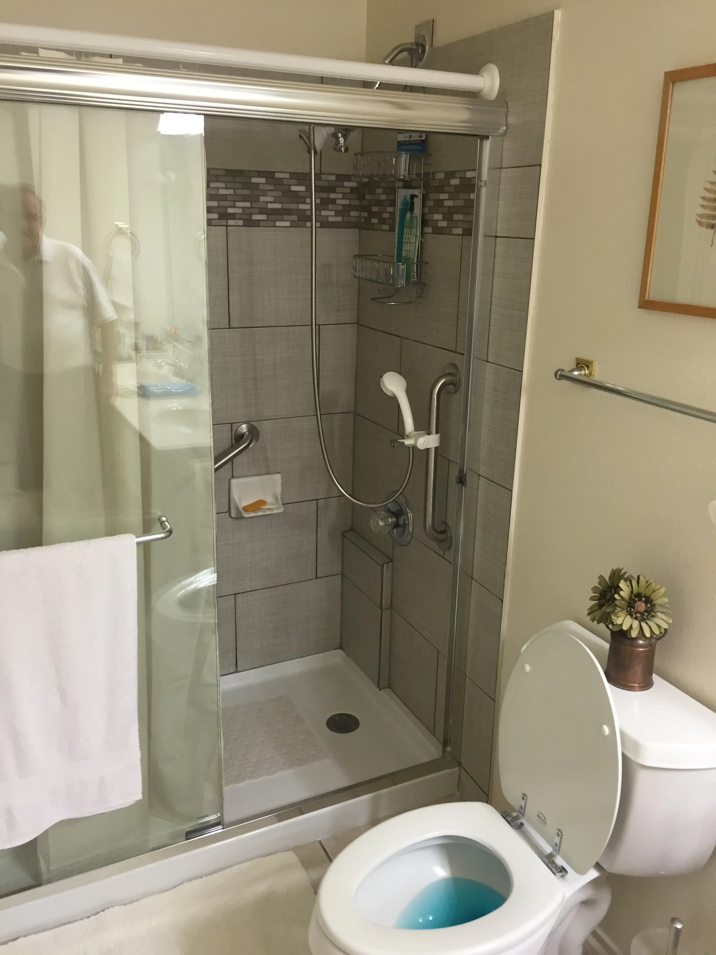 Walk in shower w glass door.jpeg