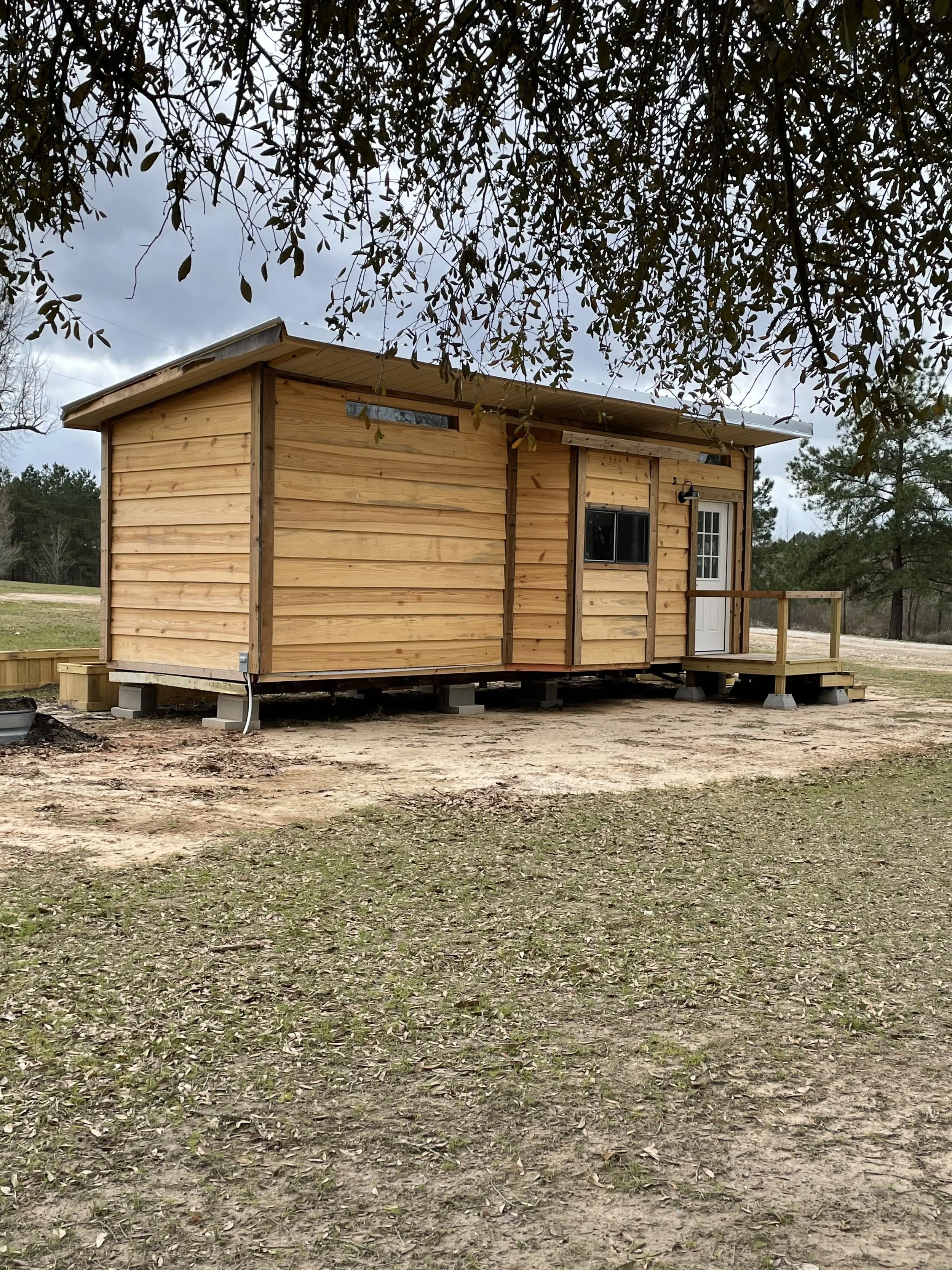 Tiny home Wood outdoor.jpeg