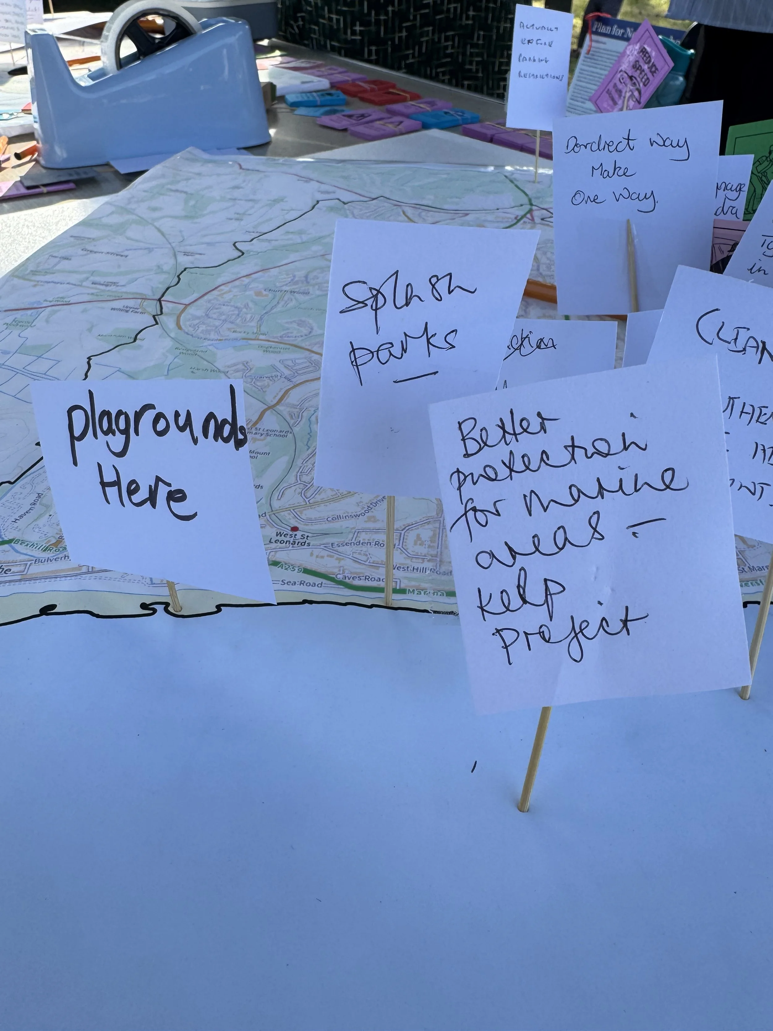 Map of Hastings with ideas to improve the town written on card and pinned into map.