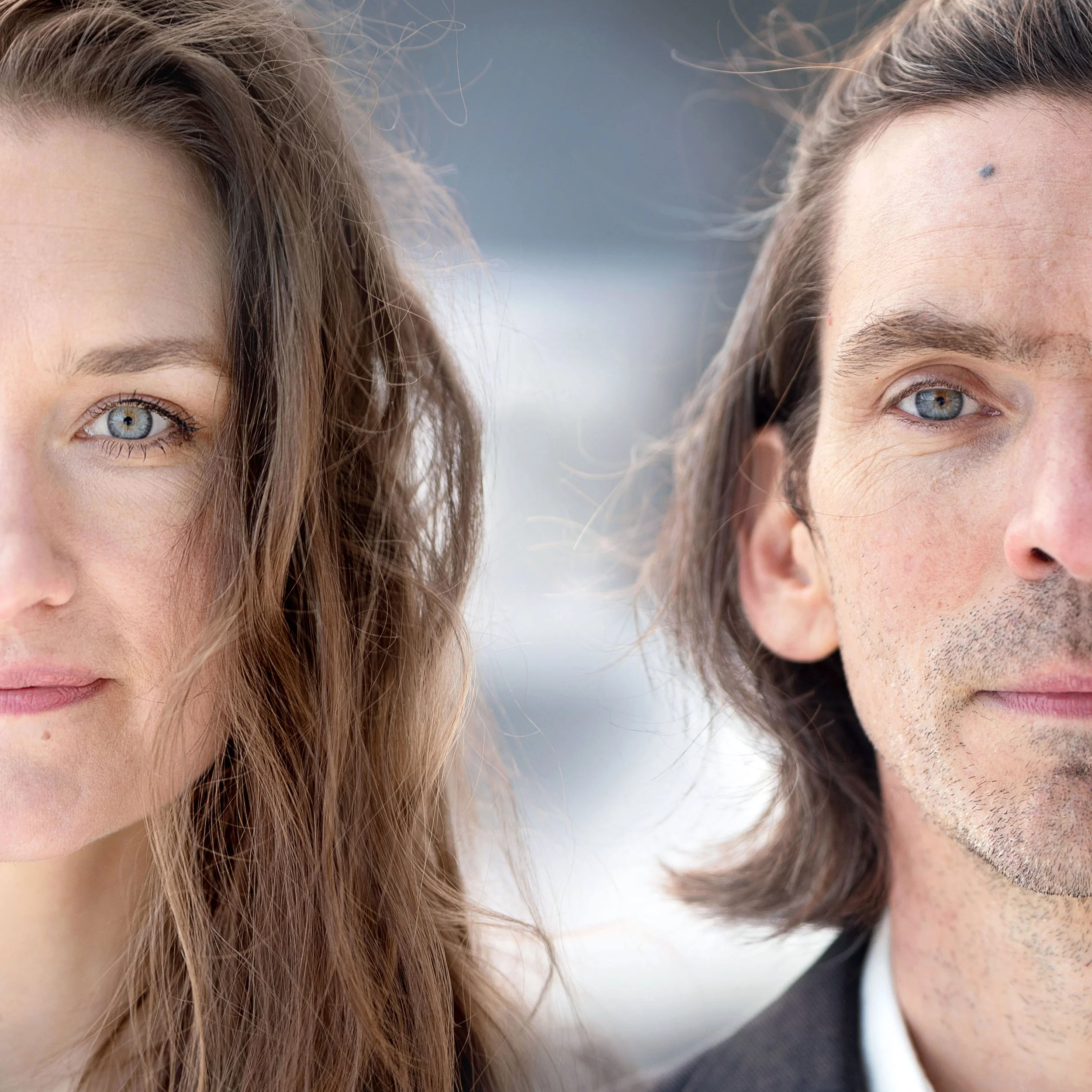 Close-up of the faces of a woman and a man with blue eyes, positioned side by side, with the woman on the left and the man on the right.