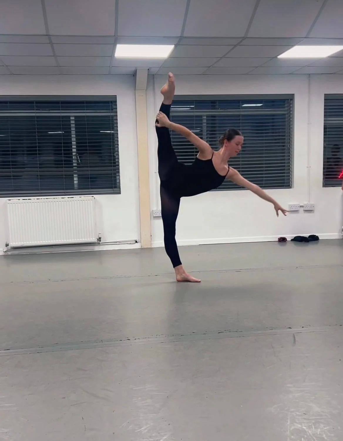 A balance exercise in leaps, turns and kicks class