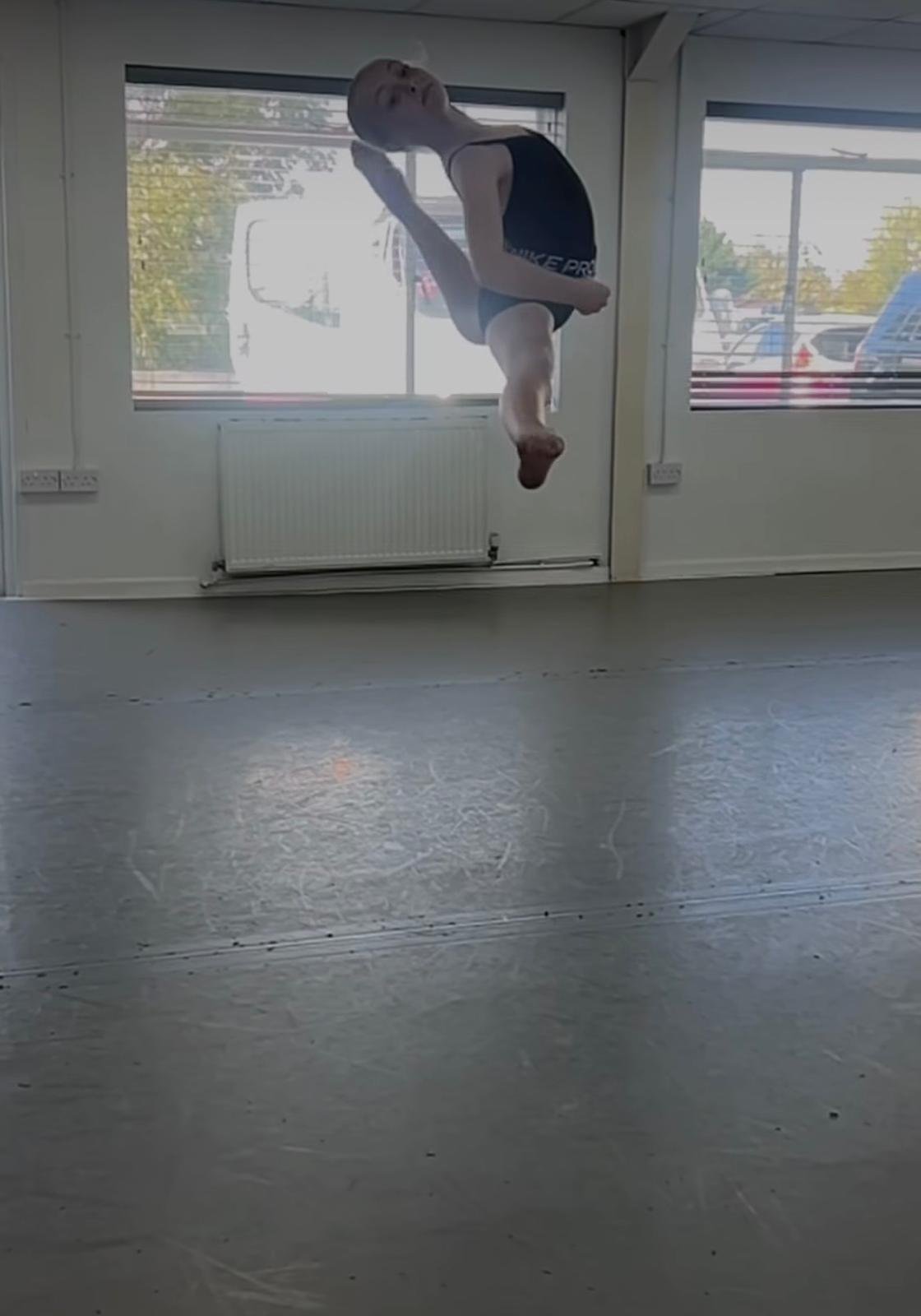 Child leaping in leaps, turns and kicks class