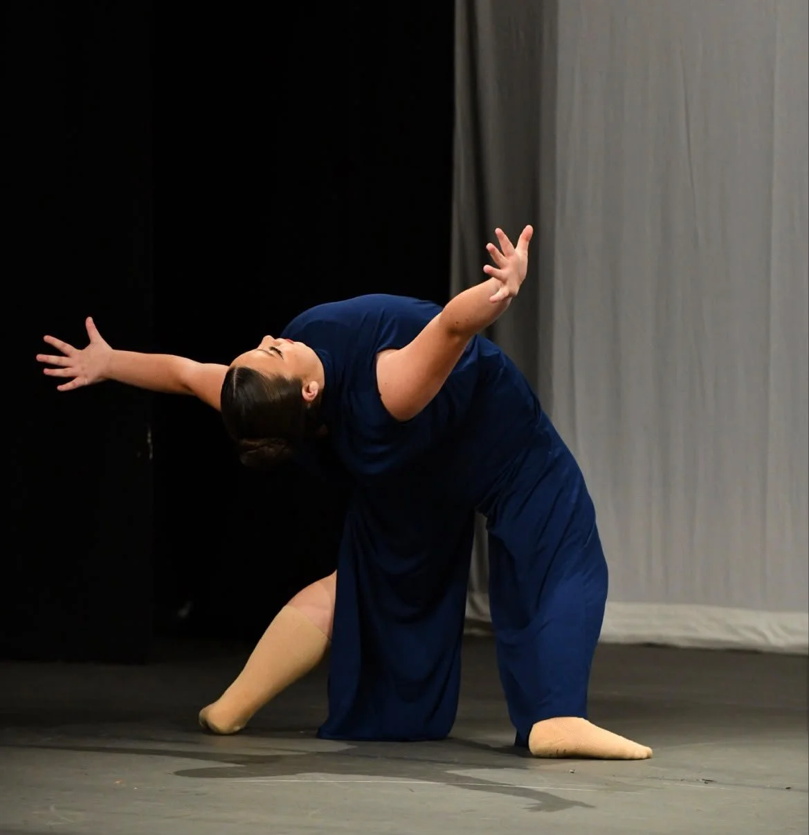Contemporary dance move on stage