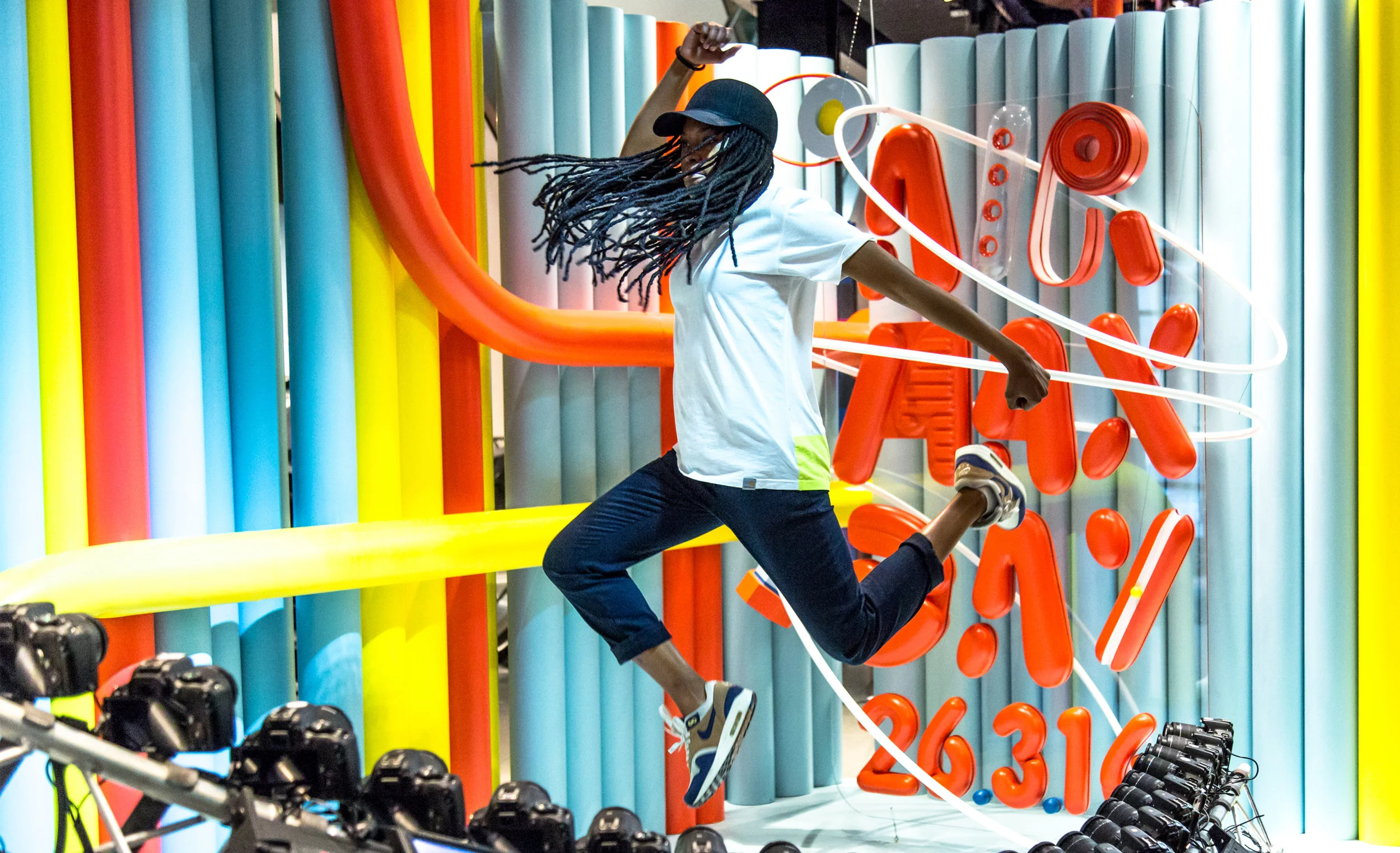 A woman jumping in the air for a viral experiential activation as part of Air Max Day 2016 in NikeTown London