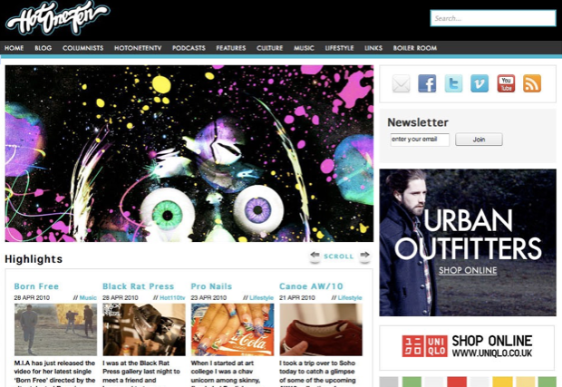 Screenshot of the Hot Hotter website homepage featuring a colorful, graffiti-style digital art with a skull, eyeballs, and splashes of paint.