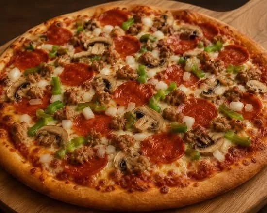 Close-up of a freshly baked pizza with pepperoni, sausage, mushrooms, green peppers, and cheese on a wooden surface.