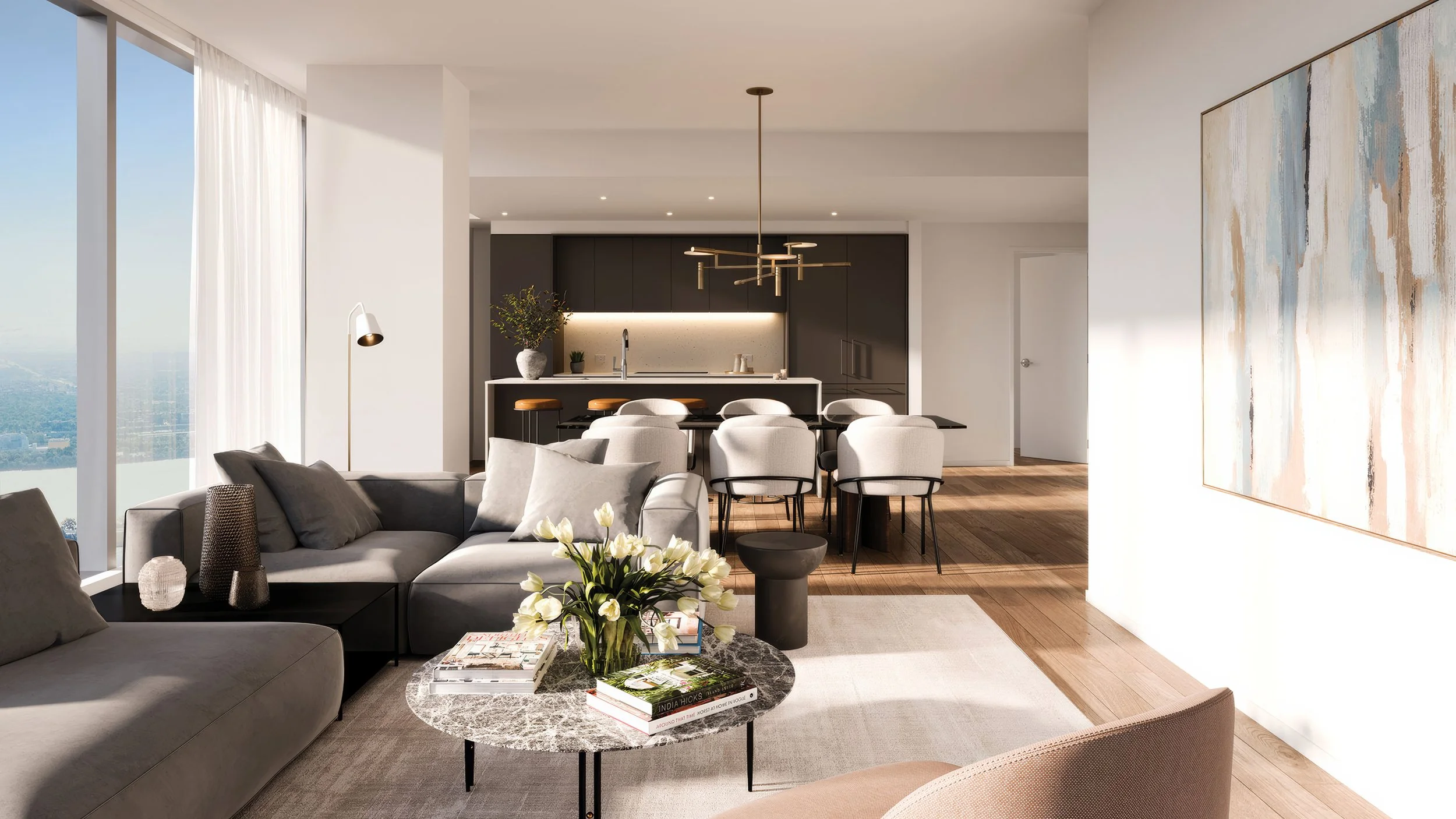 Salon et cuisine lumineux d’un condo Square Phillips au centre-ville de Montréal