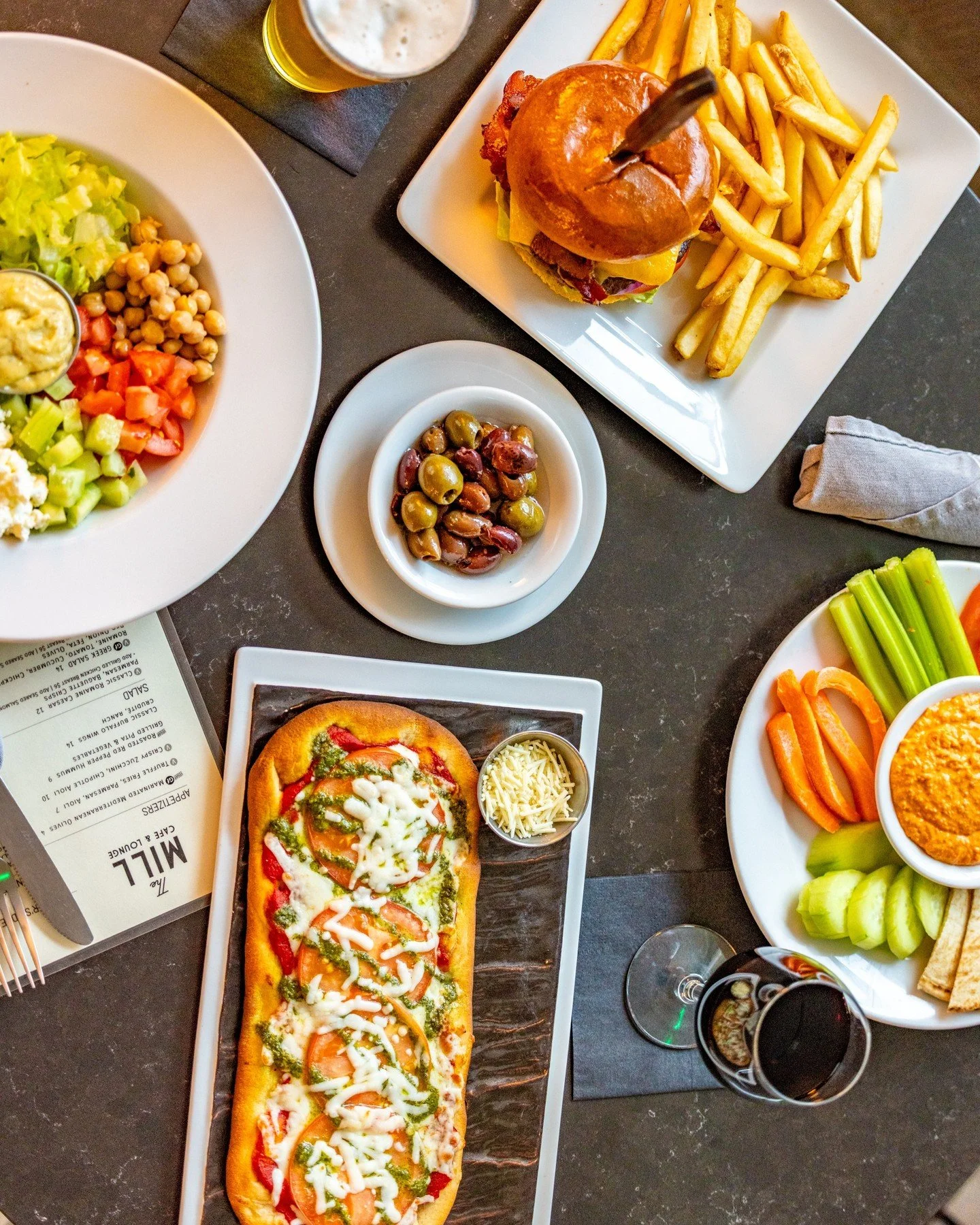 From morning coffee to evening cocktails, The Mill Cafe &amp; Lounge serves thoughtful, locally inspired fare in a relaxed riverfront setting. Stop by for breakfast, linger over lunch, or settle in for a drink after a day exploring Portland.