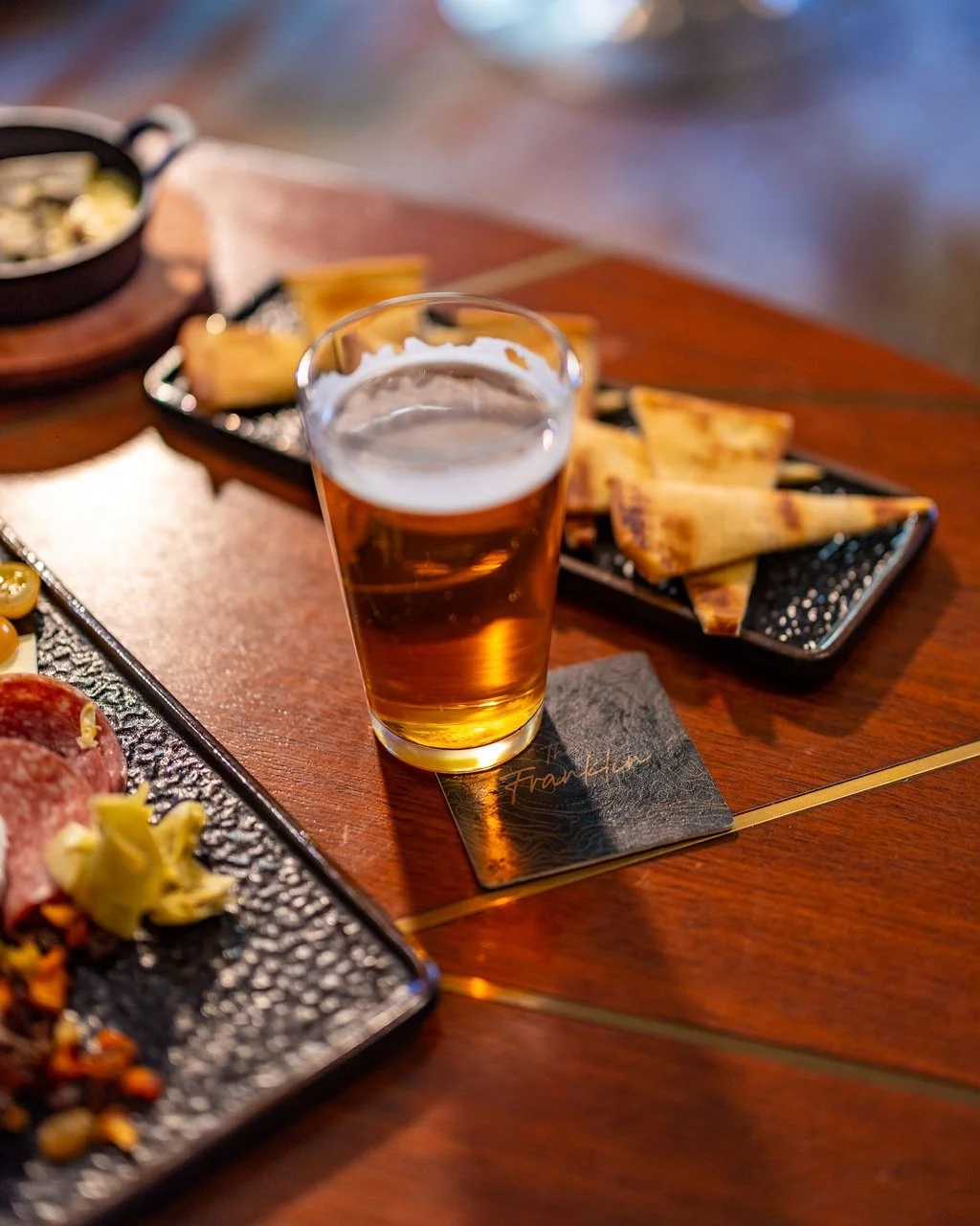After a day outside, this is where you'll find us.
ㅤ
A cold local beer, good food, and a seat at The Franklin.