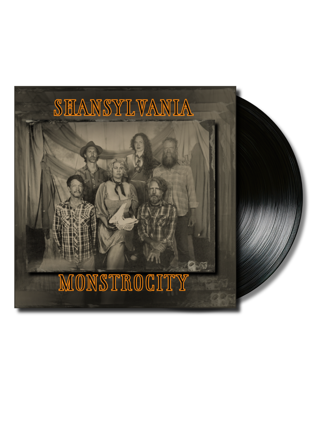 Album cover for 'MONSTROCITY' by the band Shansylvania, featuring a black-and-white photo of seven band members in old-fashioned attire, with the band name in orange text at the top and album title at the bottom.