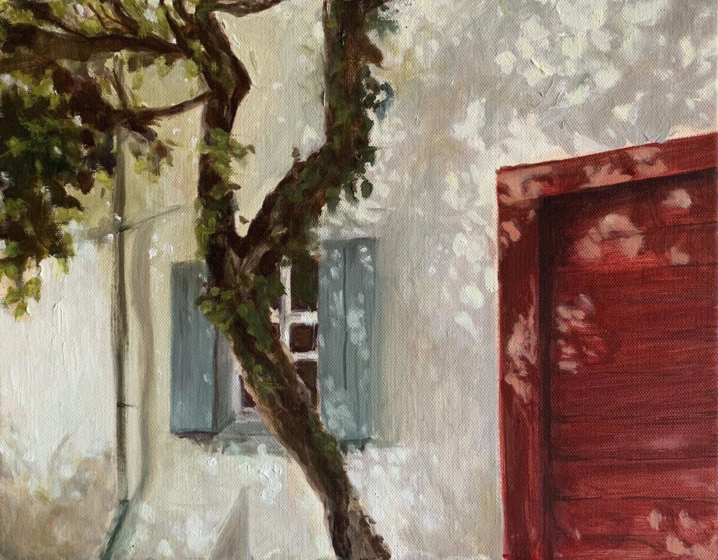 An oil painting of a tree dancing in the sunlight with shadows peppering the white house behind it.
