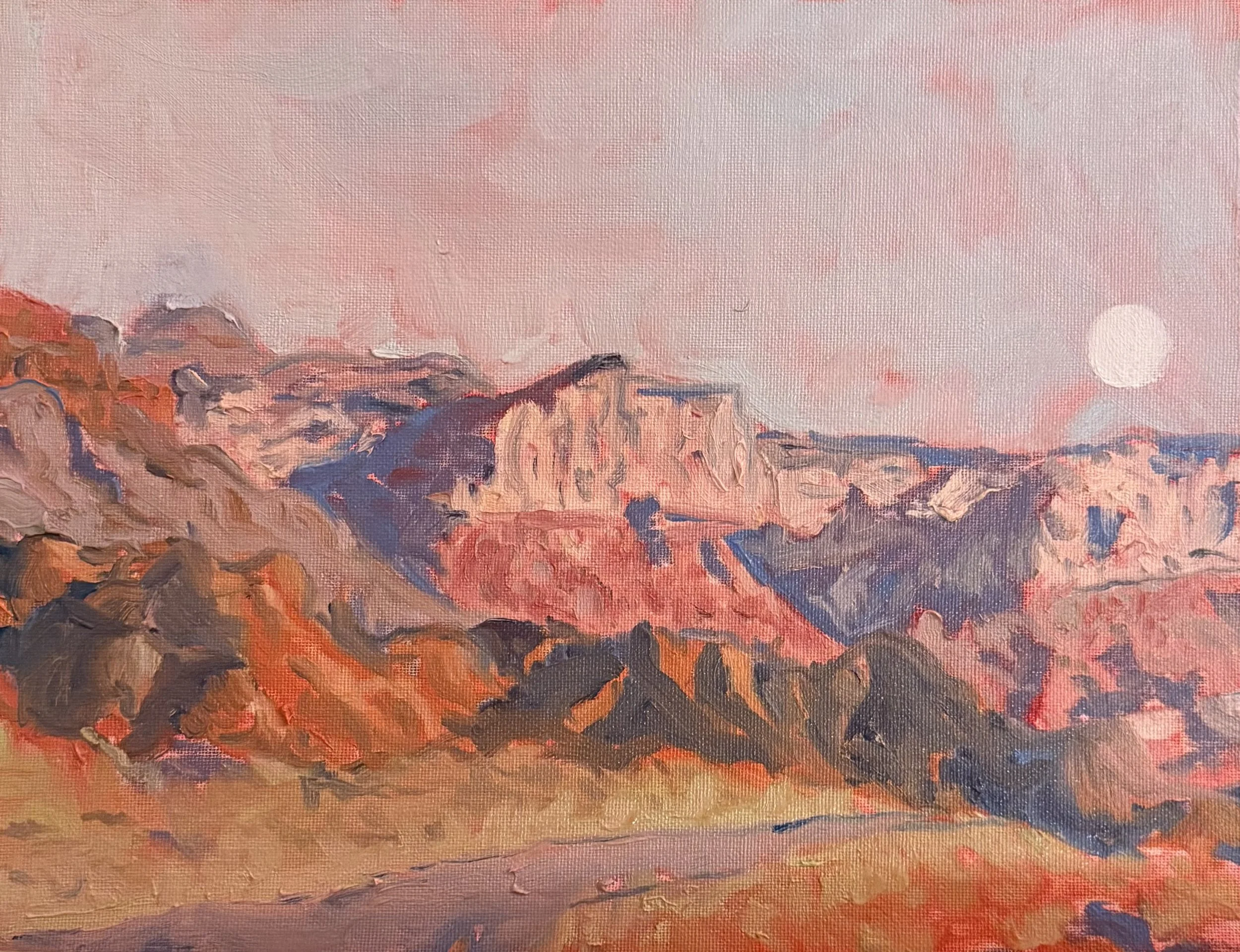A fauvist oil painting with a desert mountain range under a pink sky and a bright sun, with the foreground depicting reddish rocky terrain.