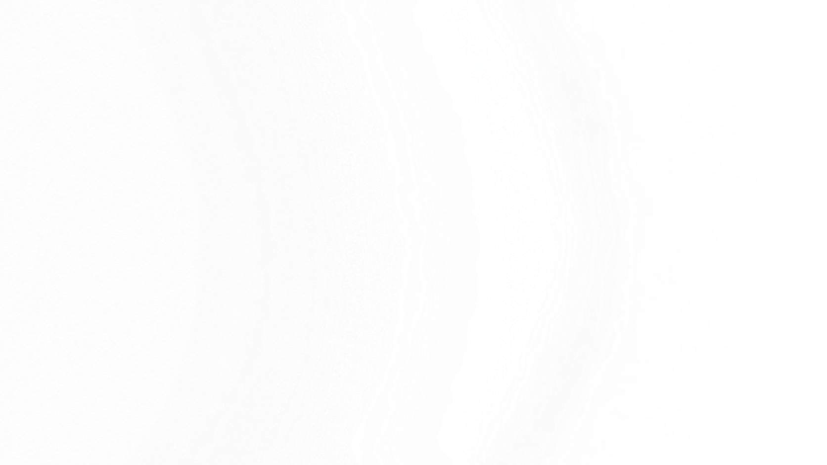 Close-up of a white ice cream scoop on a dark background.