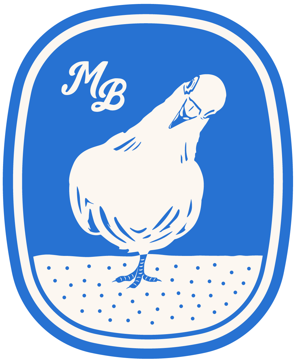 Blue oval logo with a white illustrated pigeon and the letters 'MB' in cursive at the top left.