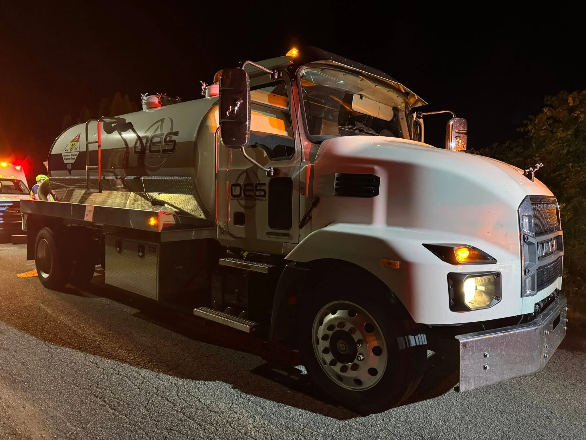 OES vacuum tanker truck used for environmental cleanup and hazardous material response.