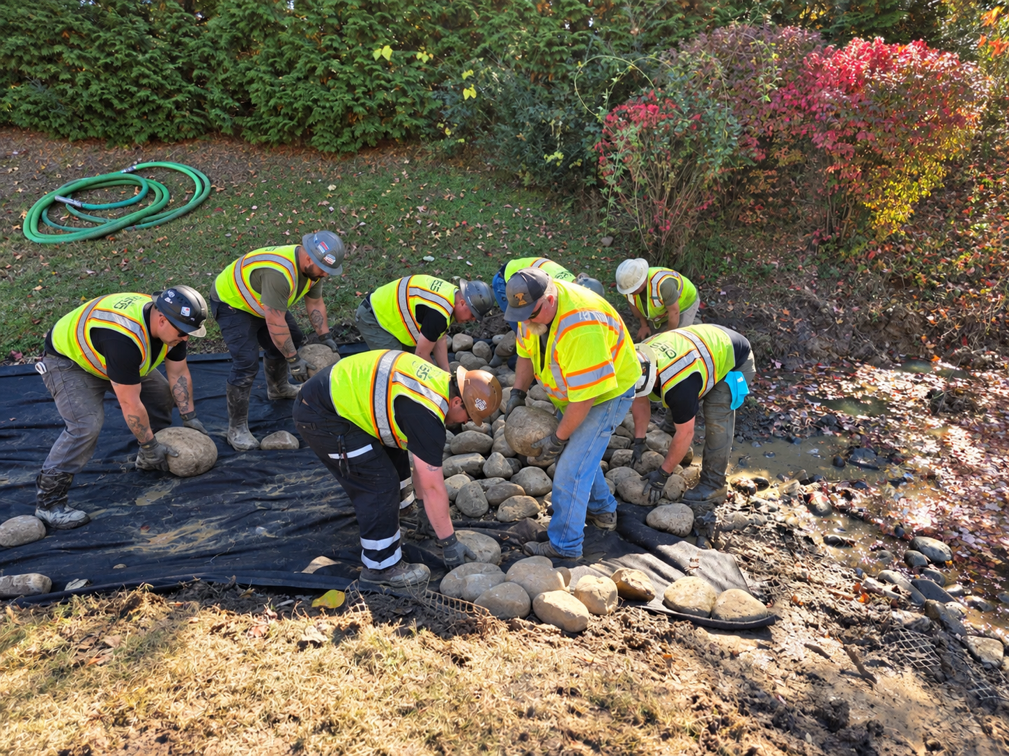 OES field crew performing environmental site remediation and stabilization work.