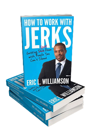 A stack of books titled "How to Work with Jerks" by Eric L. Williamson, featuring a photo of a smiling man in a suit on the cover, with handwritten notes in blue ink.