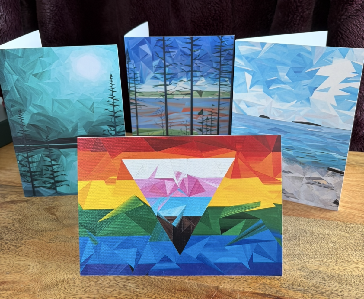 Collection of Marilyn Calleja Art greeting cards displayed together, featuring colourful geometric landscapes and nature-inspired artwork.