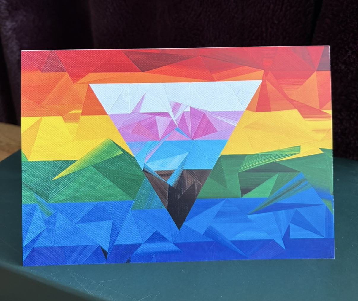 Progression greeting card, featuring Marilyn Calleja’s geometric artwork inspired by the colours of the Progress Pride flag.