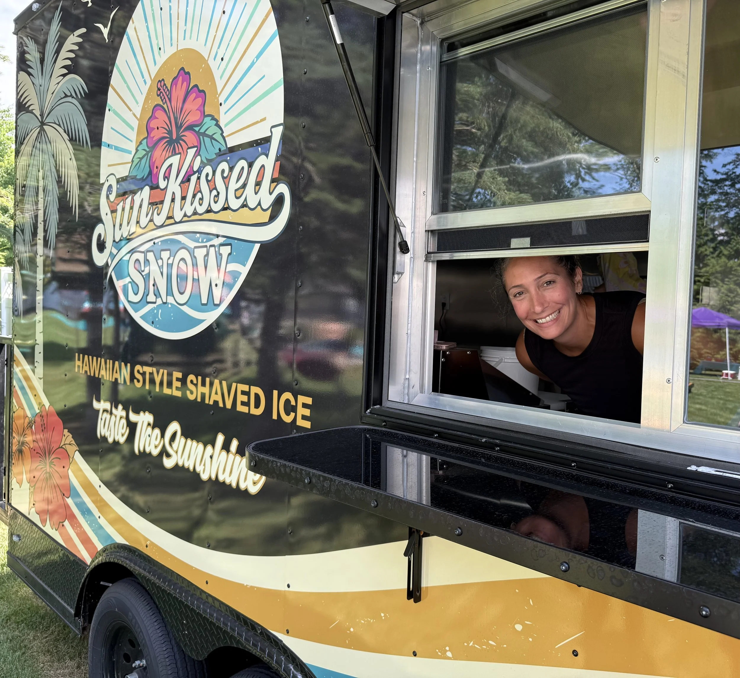 Sun Kissed Snow logo on mobile trailer