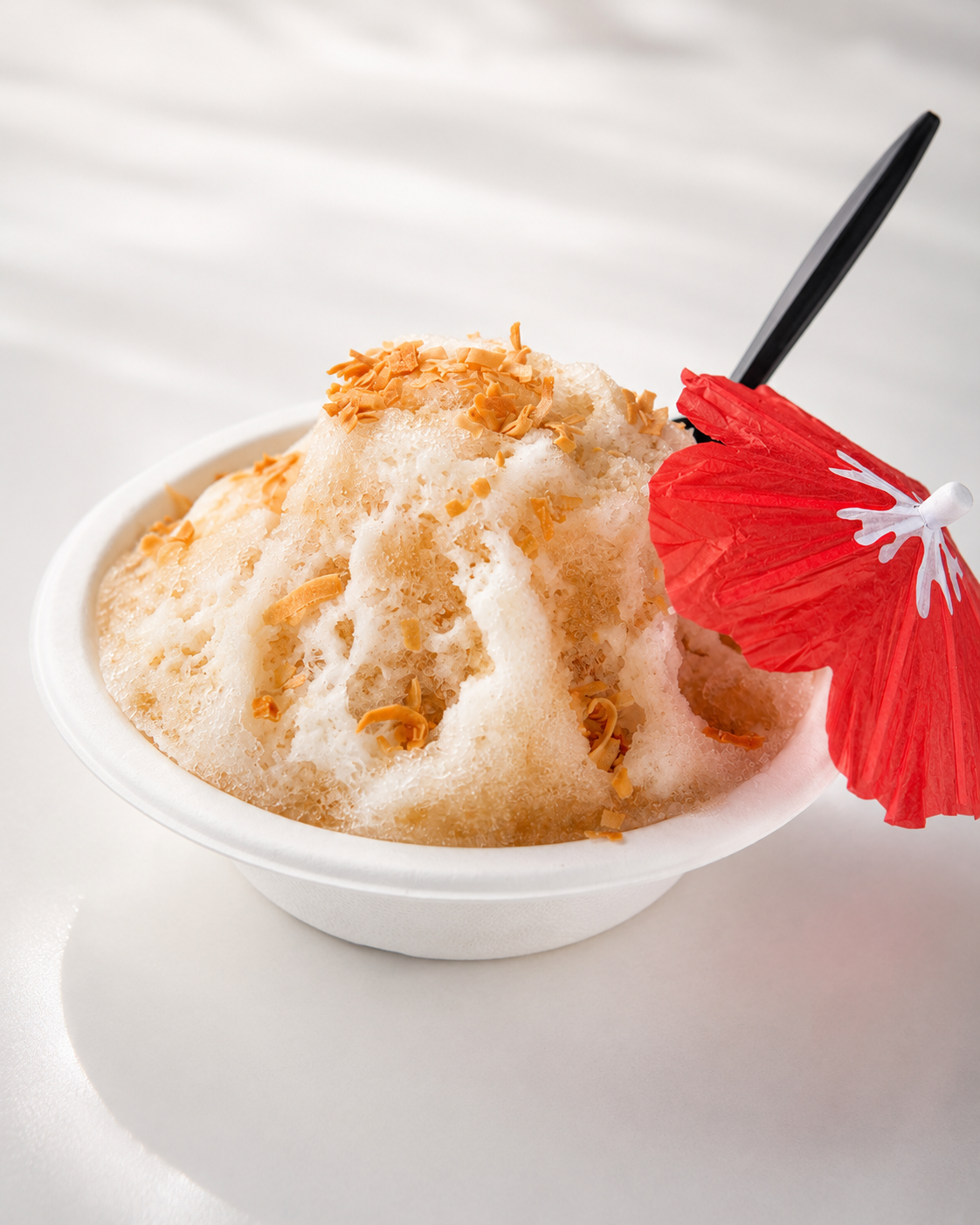 Sun Kissed Sandcastle shave ice with toasted coconut