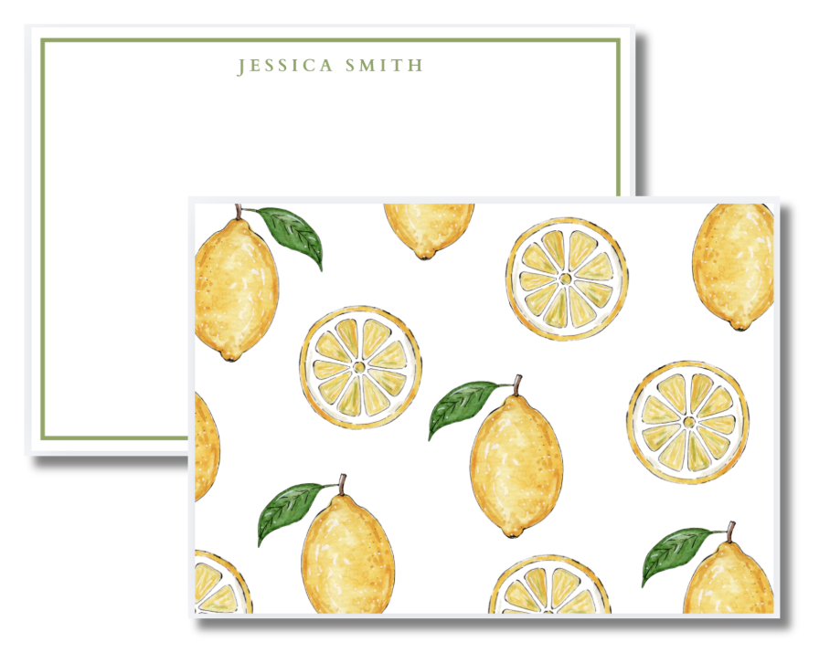 A stationery set comprising an elegant white card with green border and a lemon-themed notecard featuring whole lemons and lemon slices with green leaves.