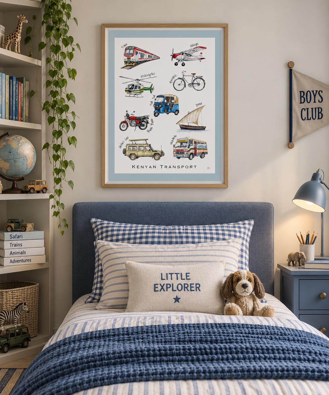 A bedroom with a poster of various Kenyan vehicles hanging above the bed, and the bed has a pillow with 'LITTLE EXPLORER' embroidered on it, along with stuffed animals. There is a lamp and a small cabinet on the right and a bookshelf with books and toy vehicles on the left.