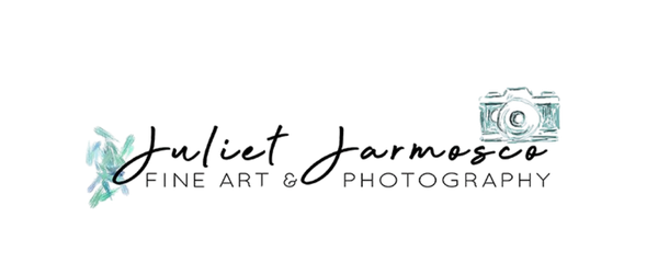Logo of a photographer with a camera icon and stylized text