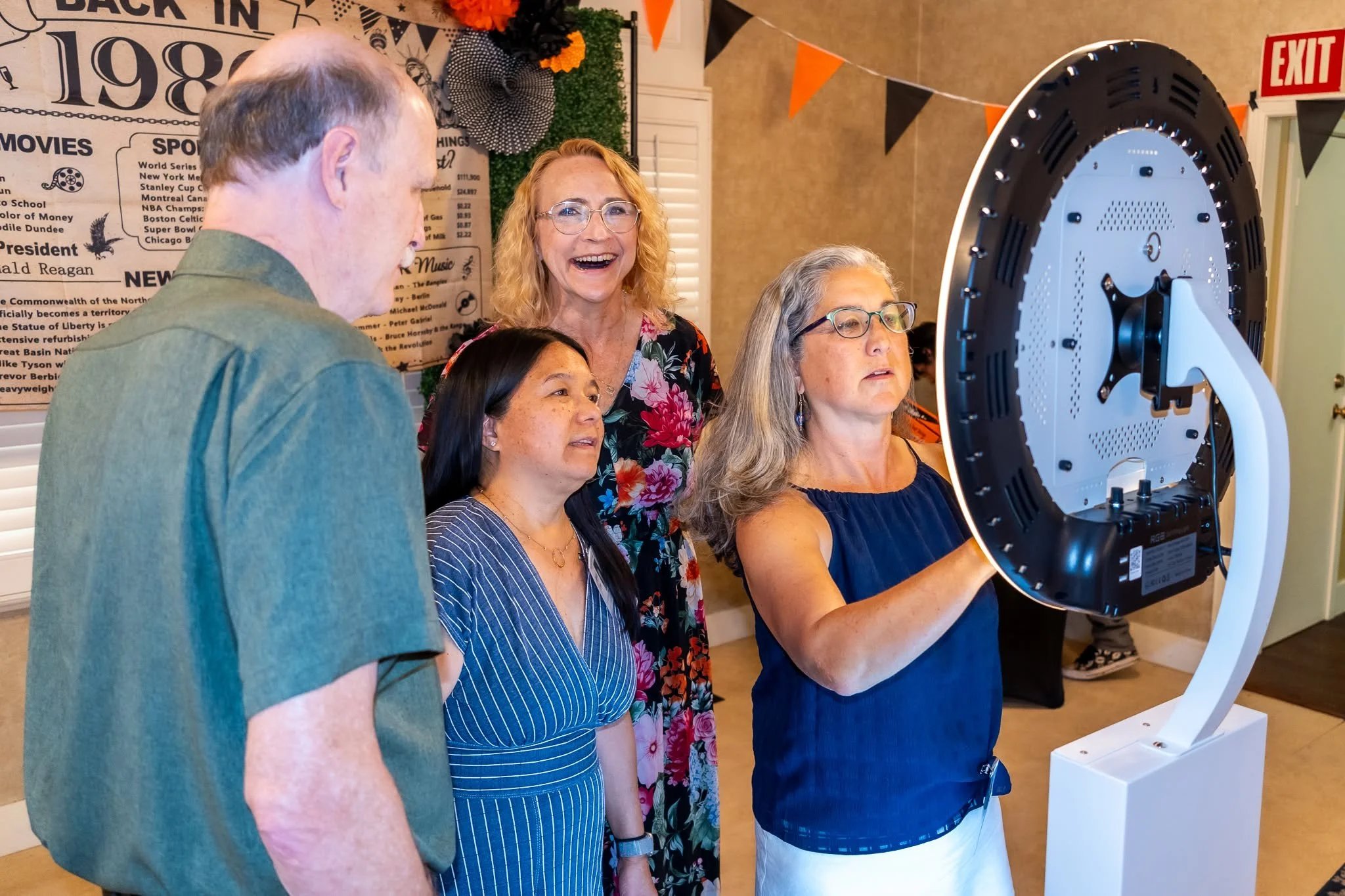 Guests entering their information on the photo booth iPad to receive their photos after their session.