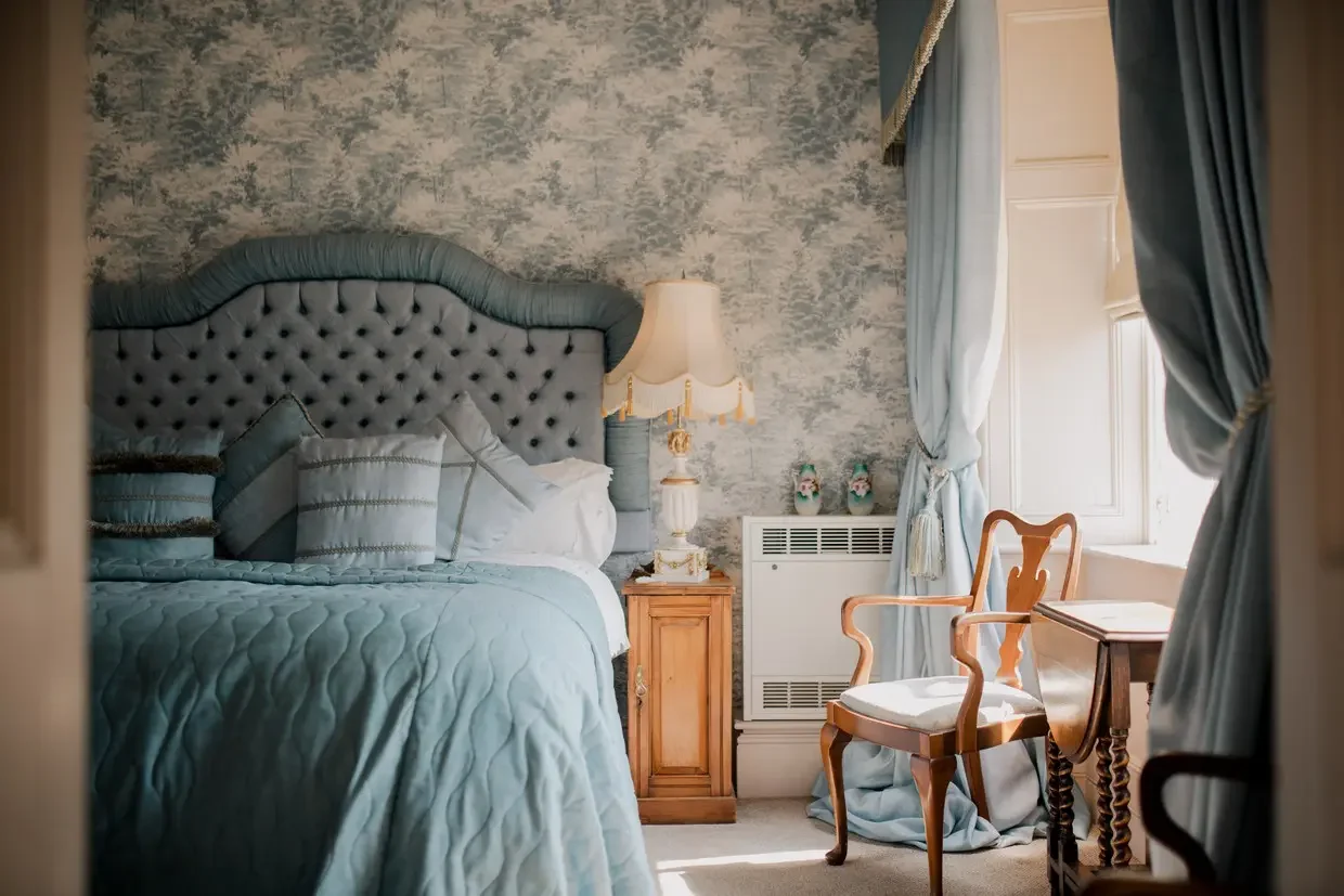 rossington-hall-teal-bedroom.jpg.webp