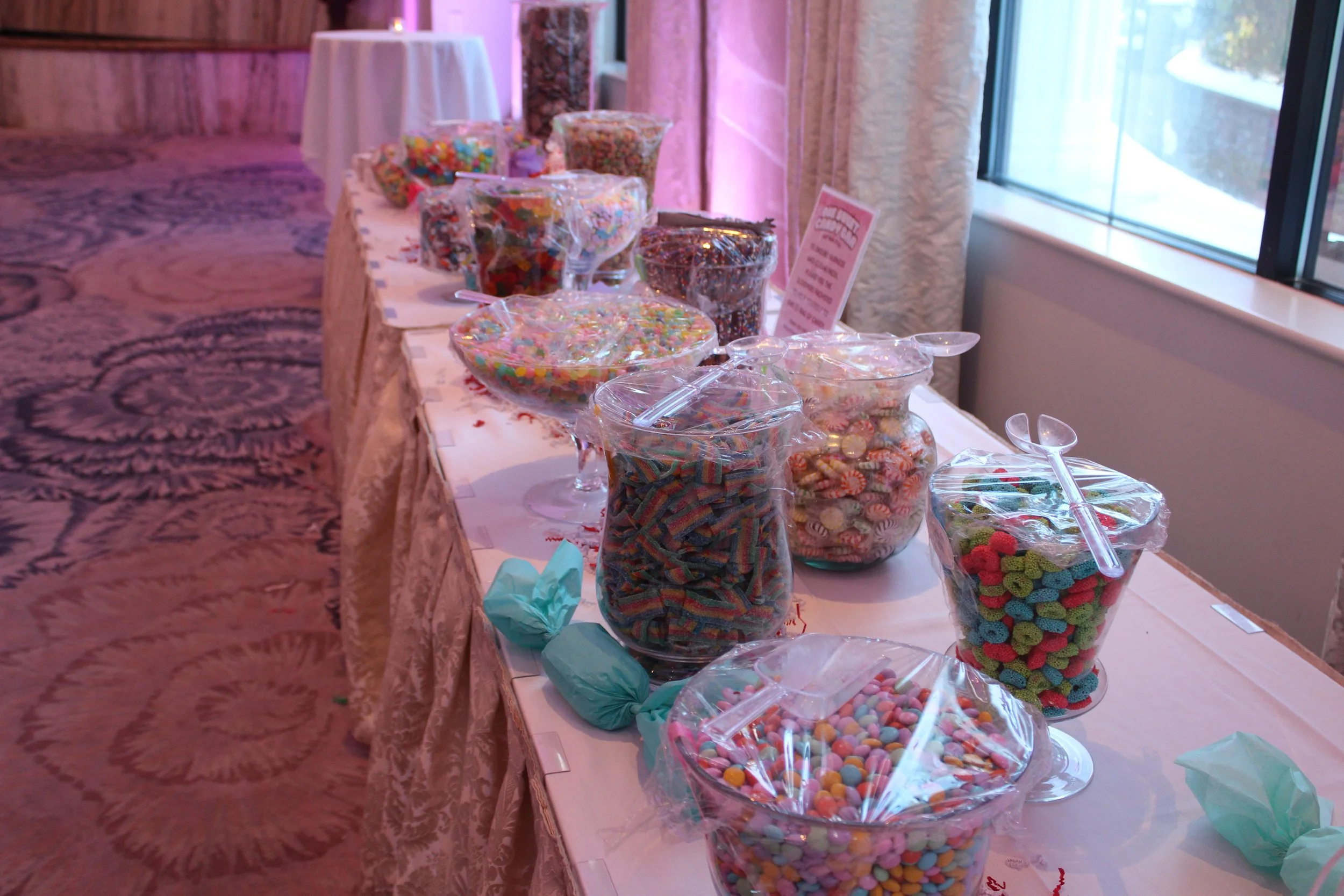 Candy display and party favor at "One Sweet Team" themed Staff Bash