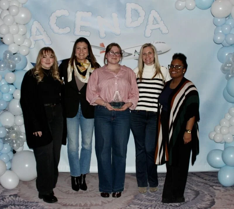 Group photo of Acenda's BME department after winning an award