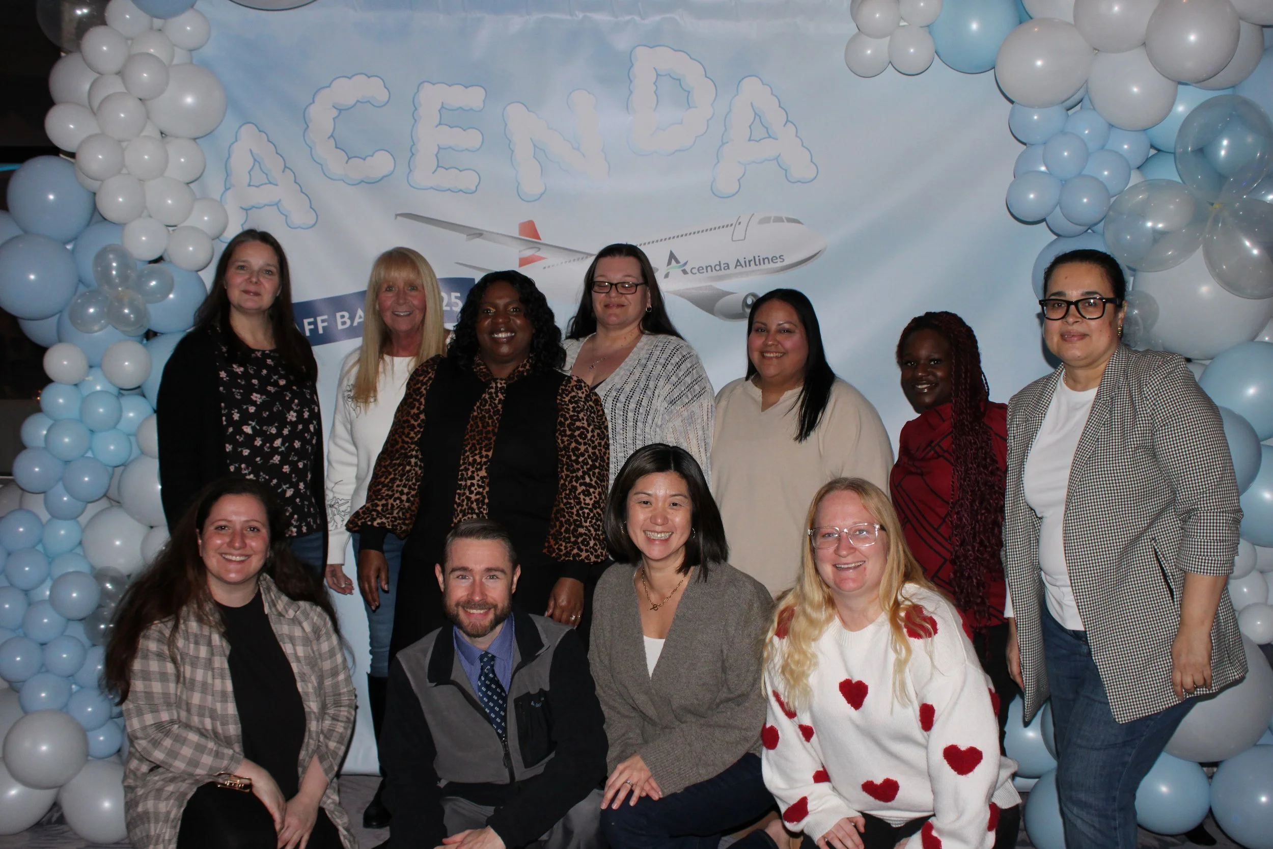 Large group of #TeamAcenda pose at 2025 Staff Bash 