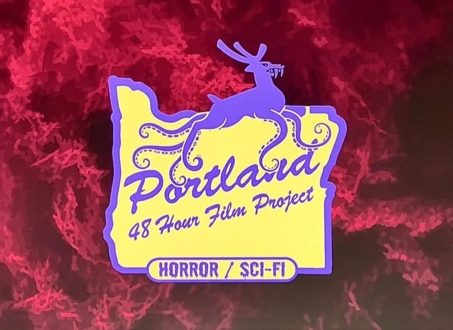 Logo for Portland 48 Hour Film Project, featuring a purple deer with tentacles on a yellow background outlined in purple, with text indicating 'Horror / Sci-Fi' genre.