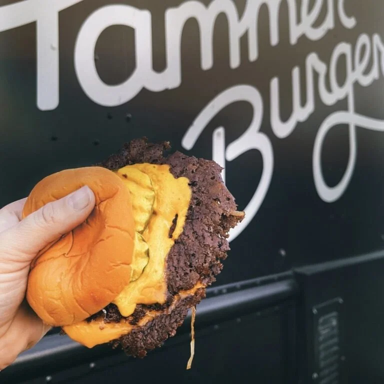 Hammer burger, hamburger in front of sign
