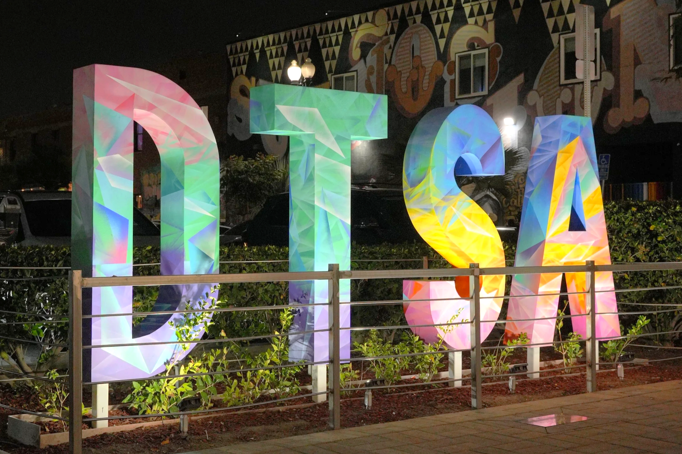 Illuminated DTSA letters at night in Downtown Santa Ana.
