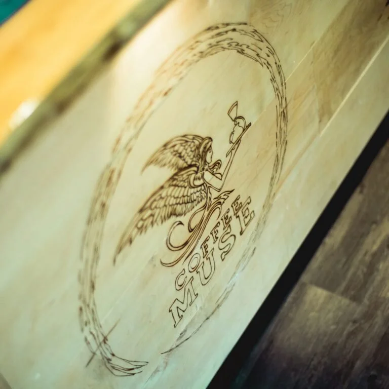 Coffee muse, wood engraving