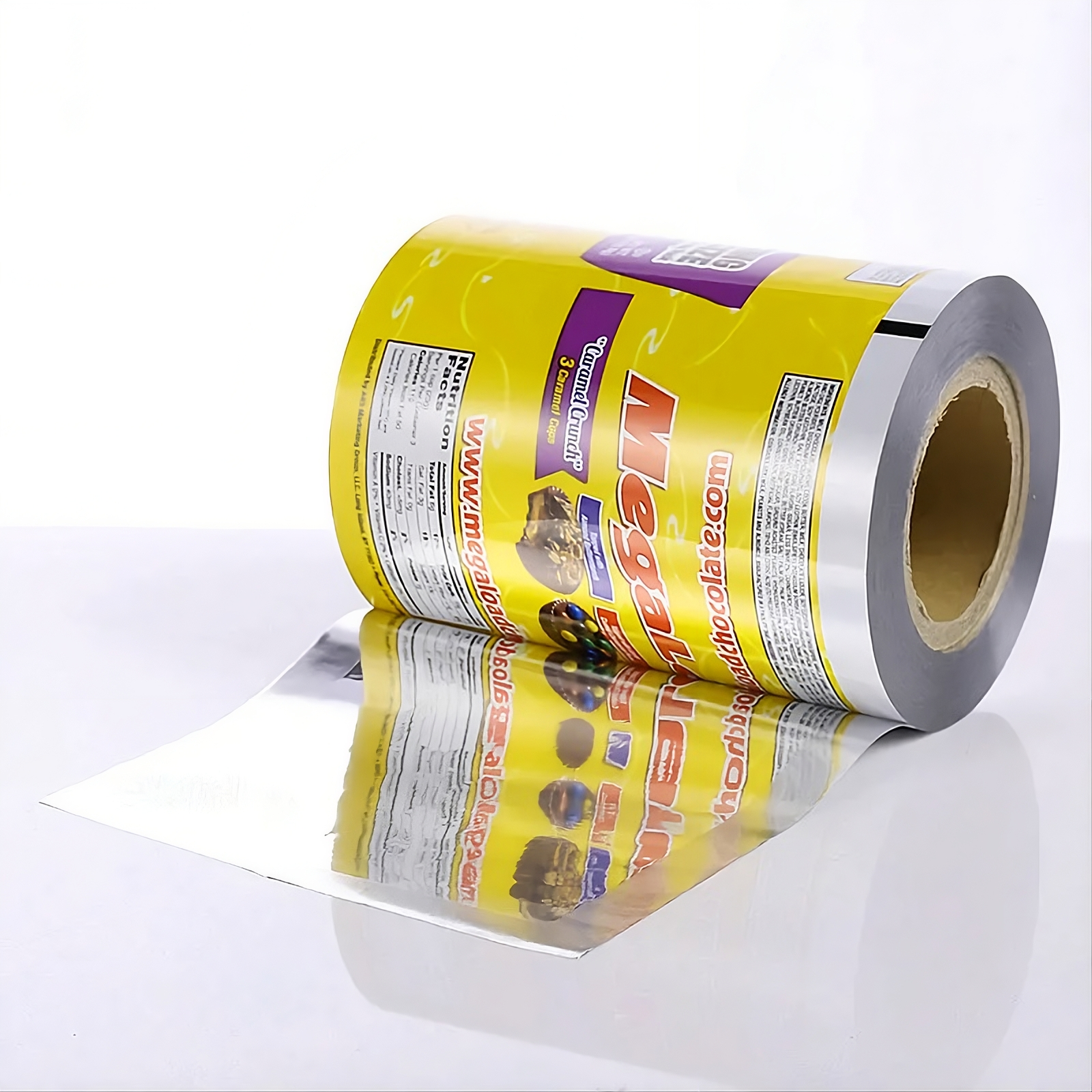 Roll of colorful candy-coated chocolates in yellow packaging with branding and nutritional information, partially unwrapped on a white surface.