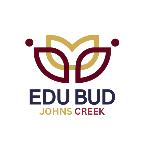 Logo for Edu Bud Johns Creek featuring stylized leaf or petal shapes in gold and burgundy with the text 'EDU BUD' in navy and 'JOHNS CREEK' in gold and burgundy.