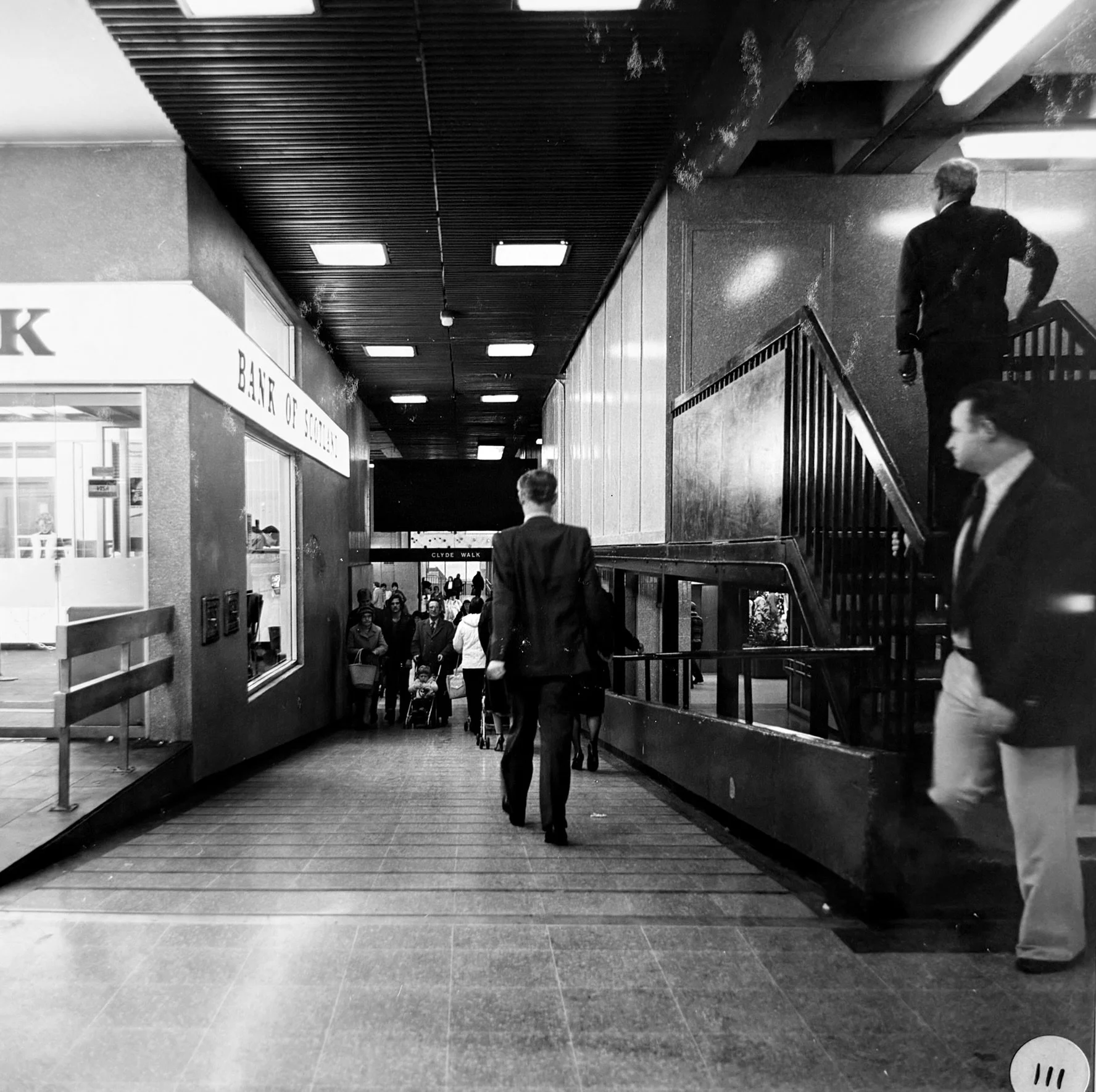 Ramp going down past Bank of Scotland. Photo taken from CDC Collection, held in NLC Archives.