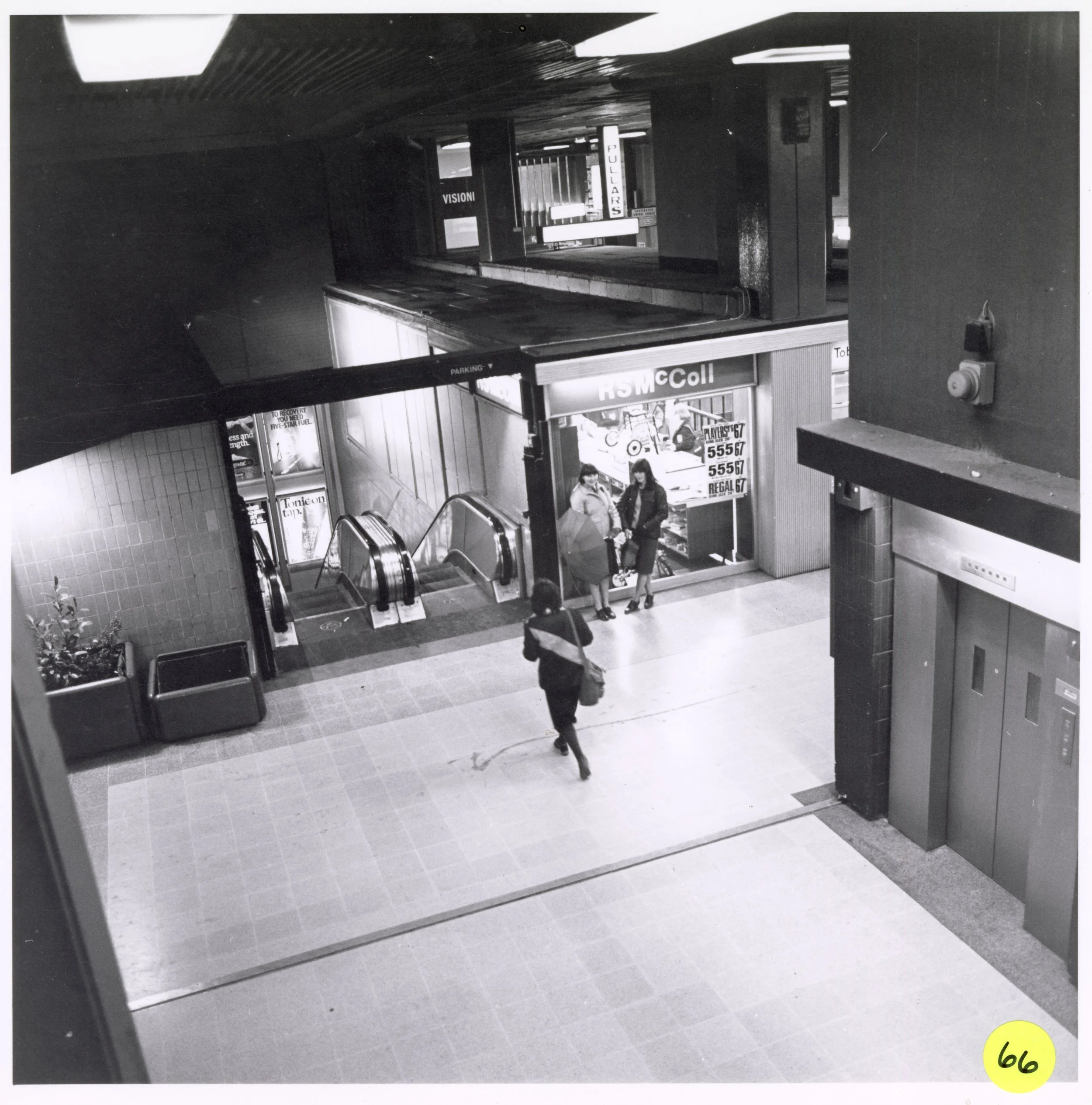 Shot of lifts and escalators in Phase 1. Photo taken from CDC Collection, held in NLC Archives.