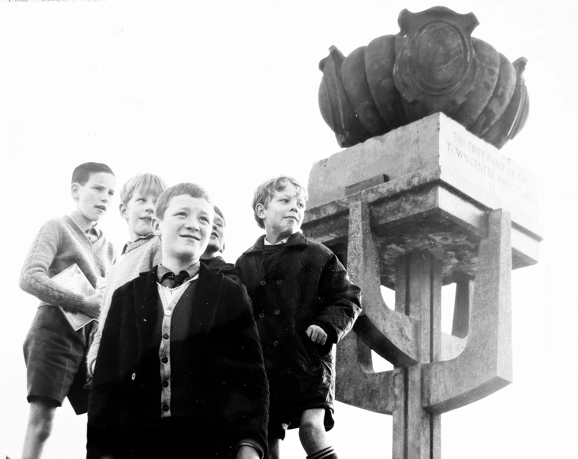Local boys at the sculpture. Photo taken from CDC Collection, held in NLC Archives.