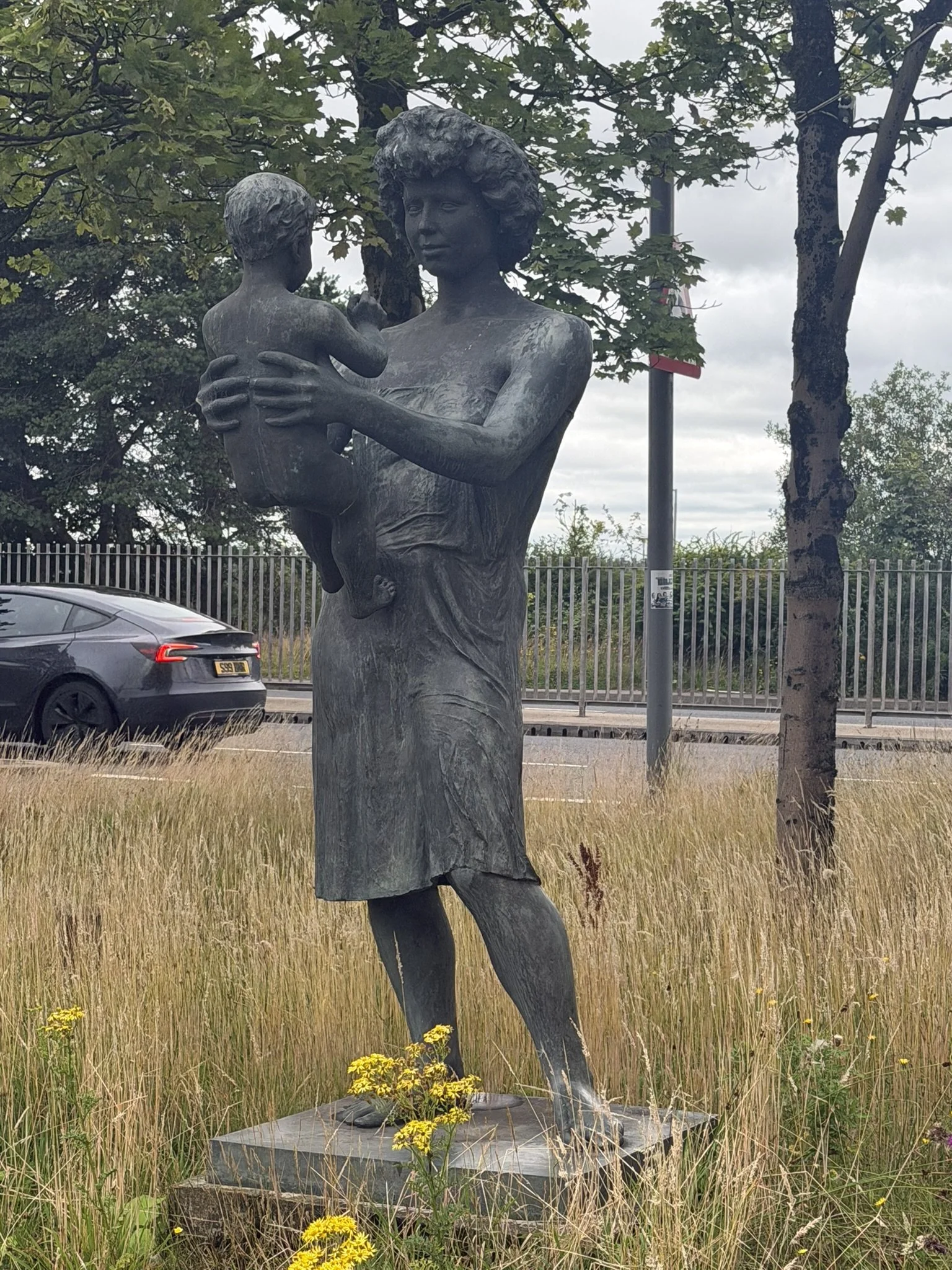 Mother and Child statue, now located outside Phase 4 mall