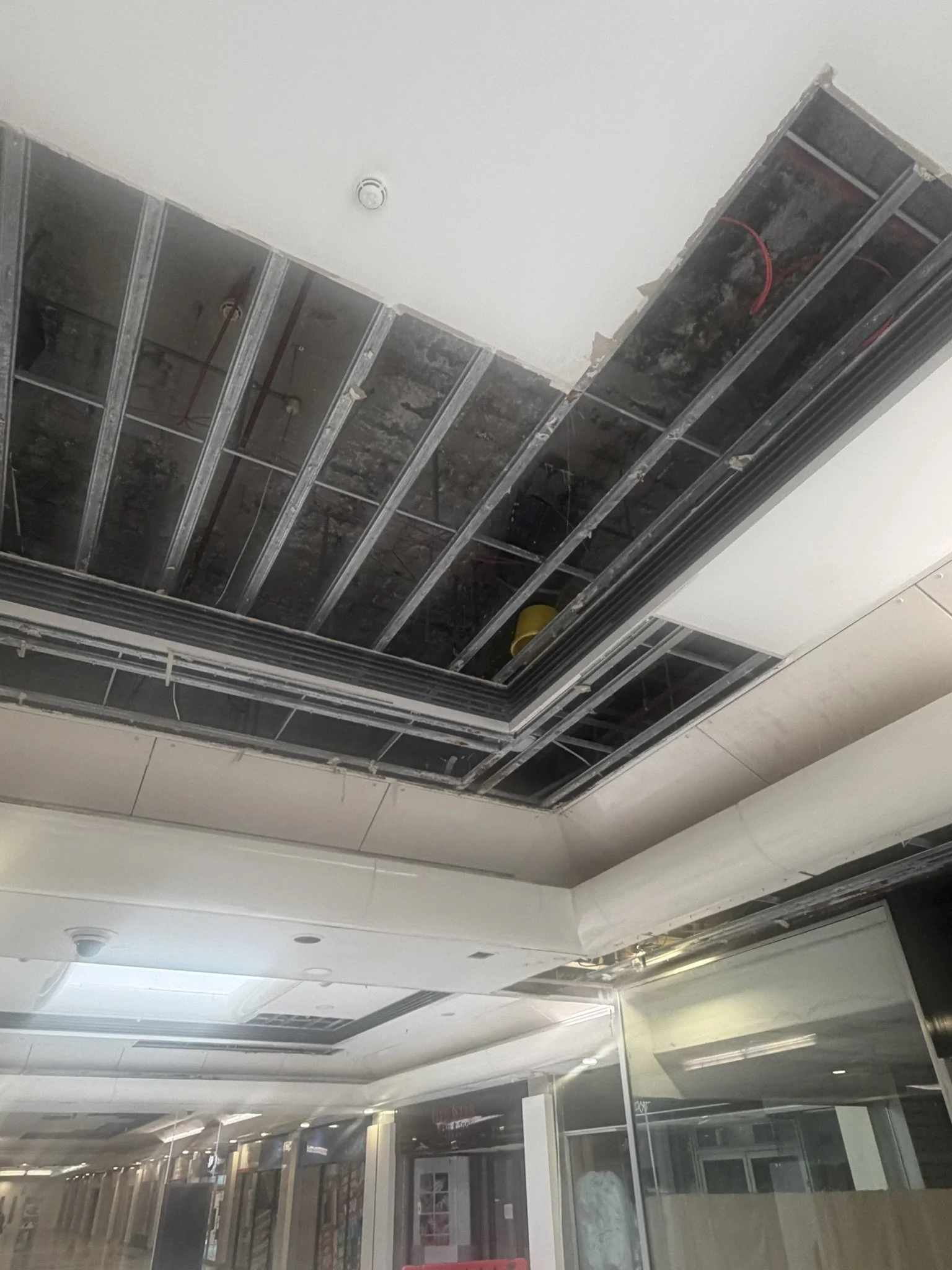 Missing ceiling tiles in Phase 4 mall